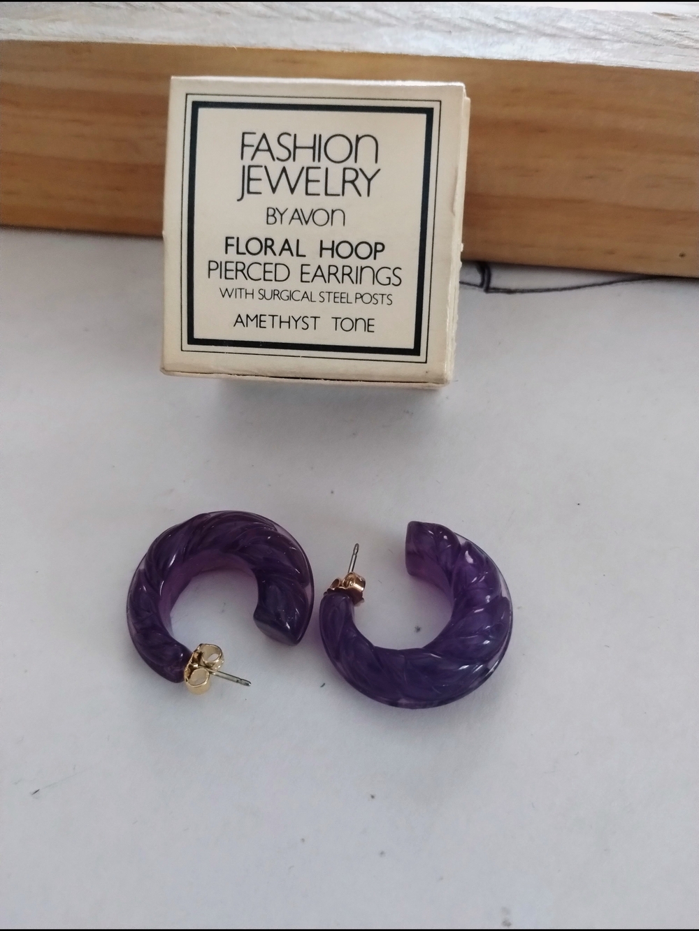 Avon Amethyst Tone Floral Twist Hoop Earrings